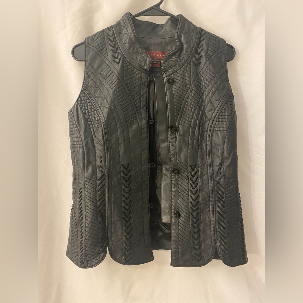 Elegant Black Leather Vest with Intricate Patterns